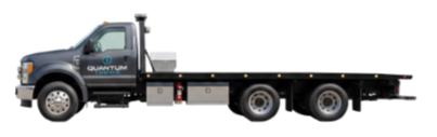 White tow truck with flatbed, black bed, and orange and brown decals.