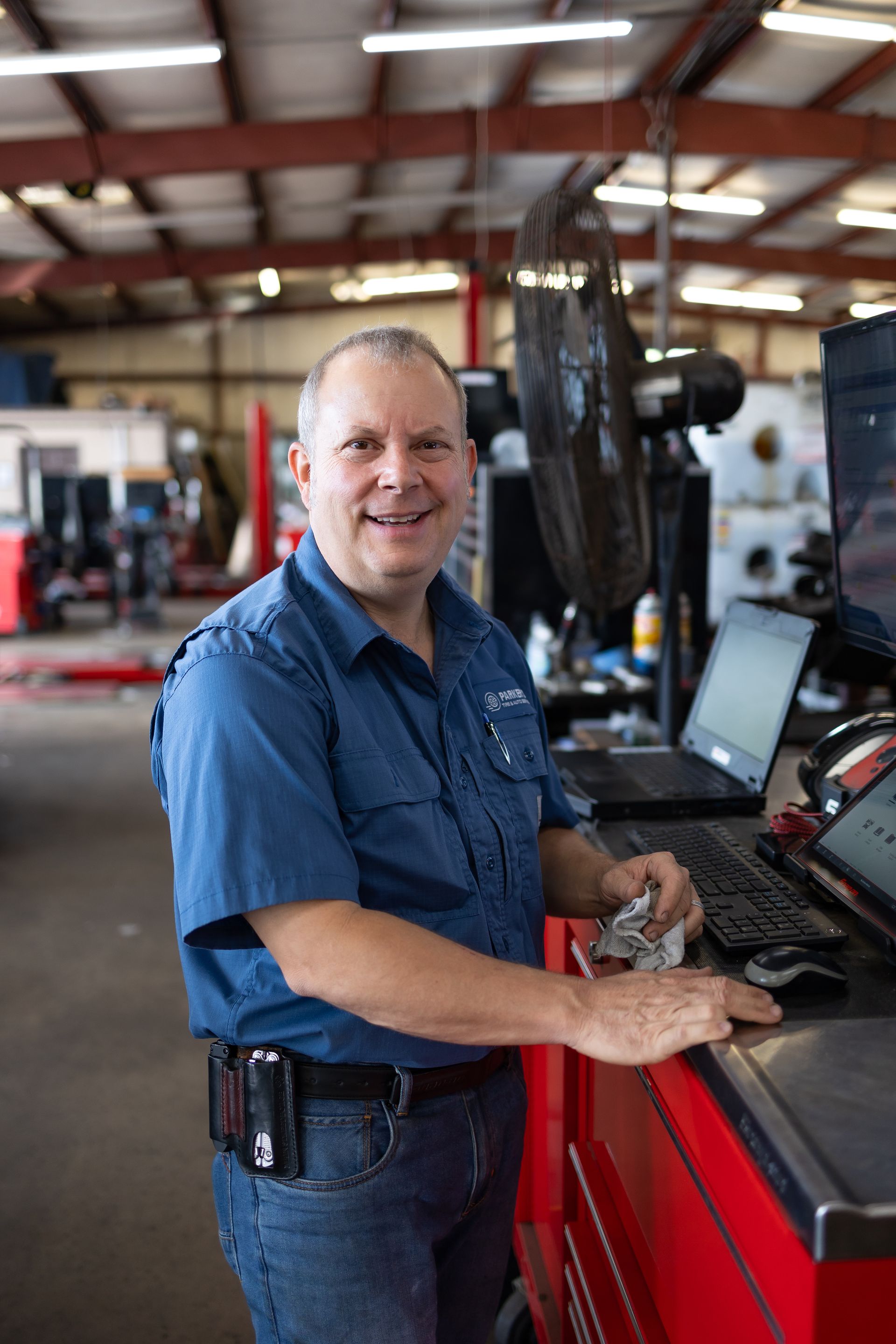 Mechanic in Garage | Parker's Tire & Auto Service