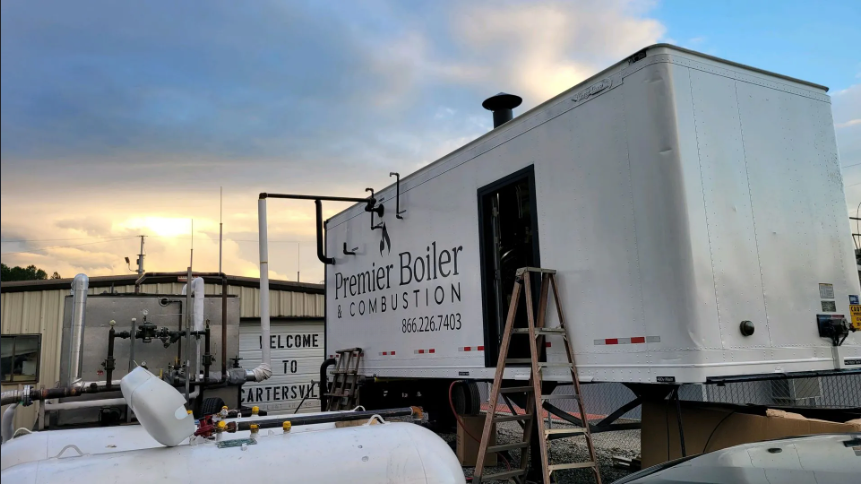 White trailer labeled 