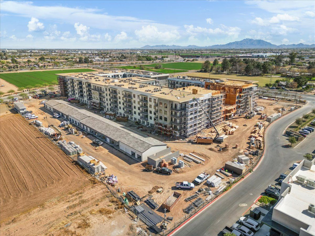 An aerial view of a large building under construction.