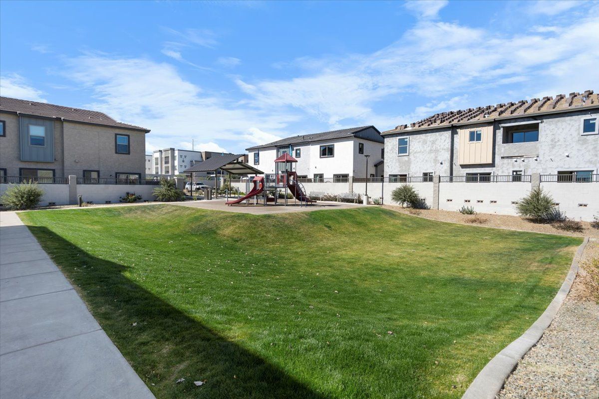 A park with a playground in the middle of it