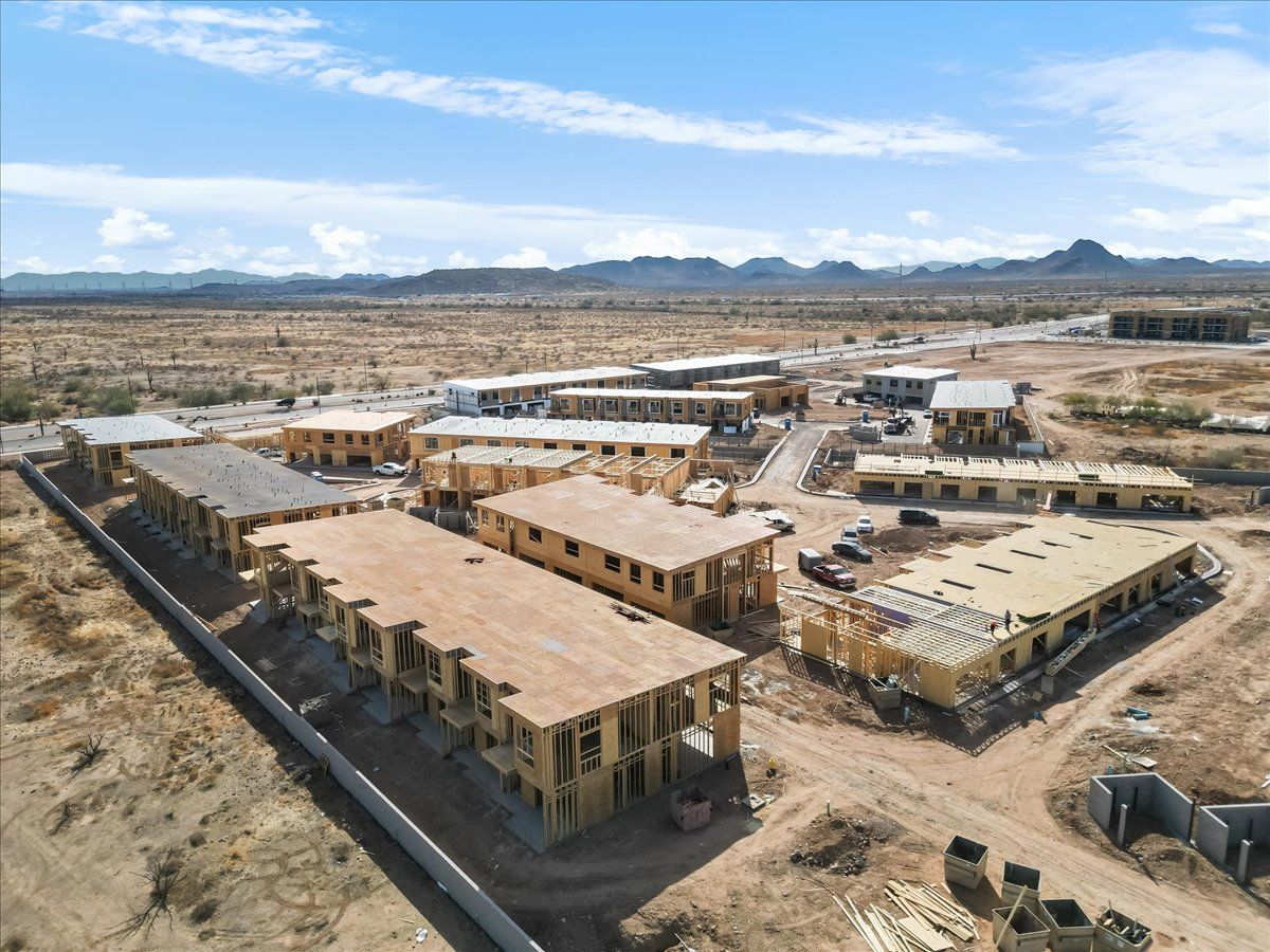 An aerial view of a building under construction in the desert.