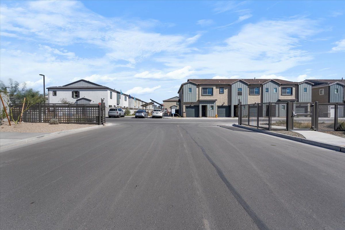 There are a lot of houses on the side of the road.