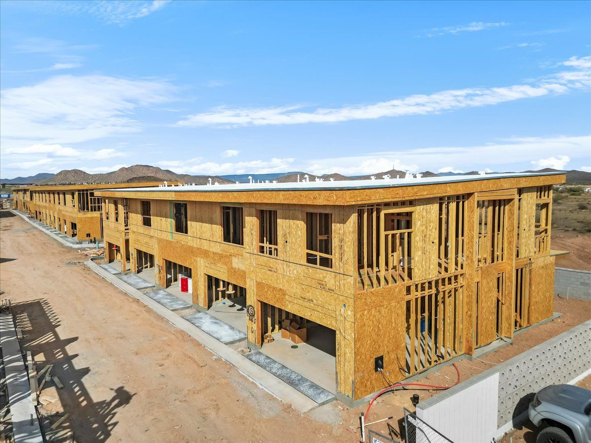 An aerial view of a building under construction in the desert.