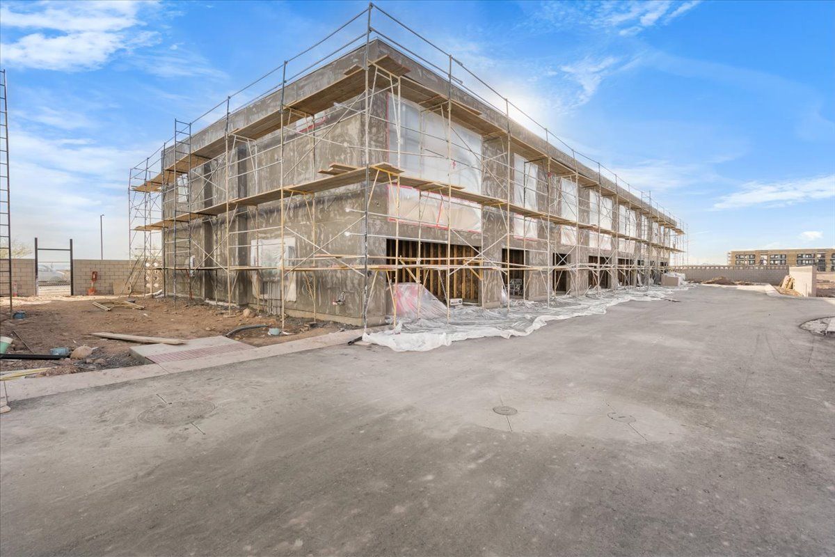 A large building is being built with scaffolding around it.