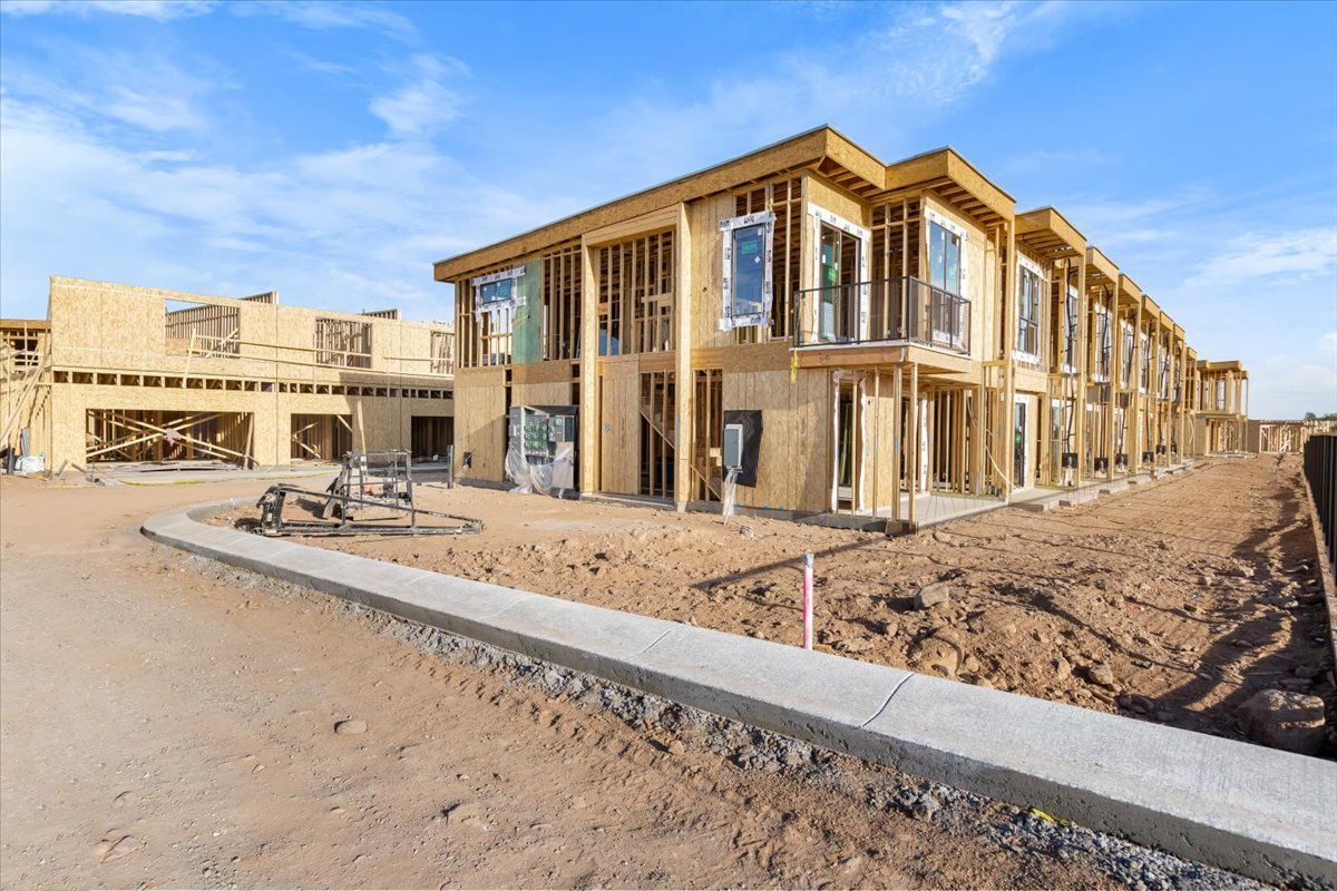 A large building is being built in the desert.