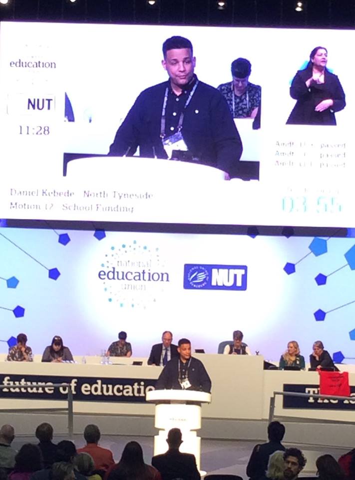 NUT Section Executive Member Daniel Kebede talking at conference