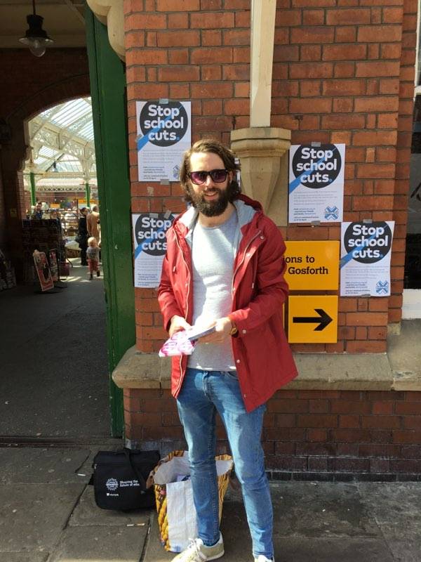 NEU member highlighting school cuts in Tynemouth