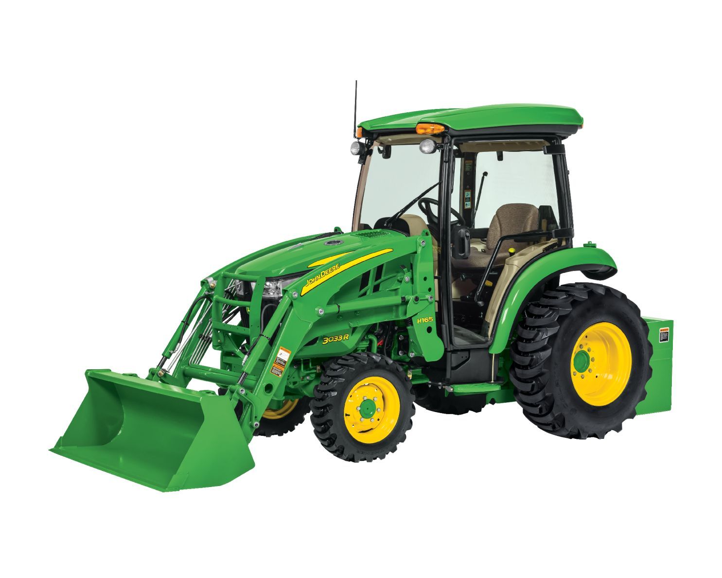 Metal John Deere branded hydraulic parts sit on a yellow store shelf next to a green and yellow toy tractor.