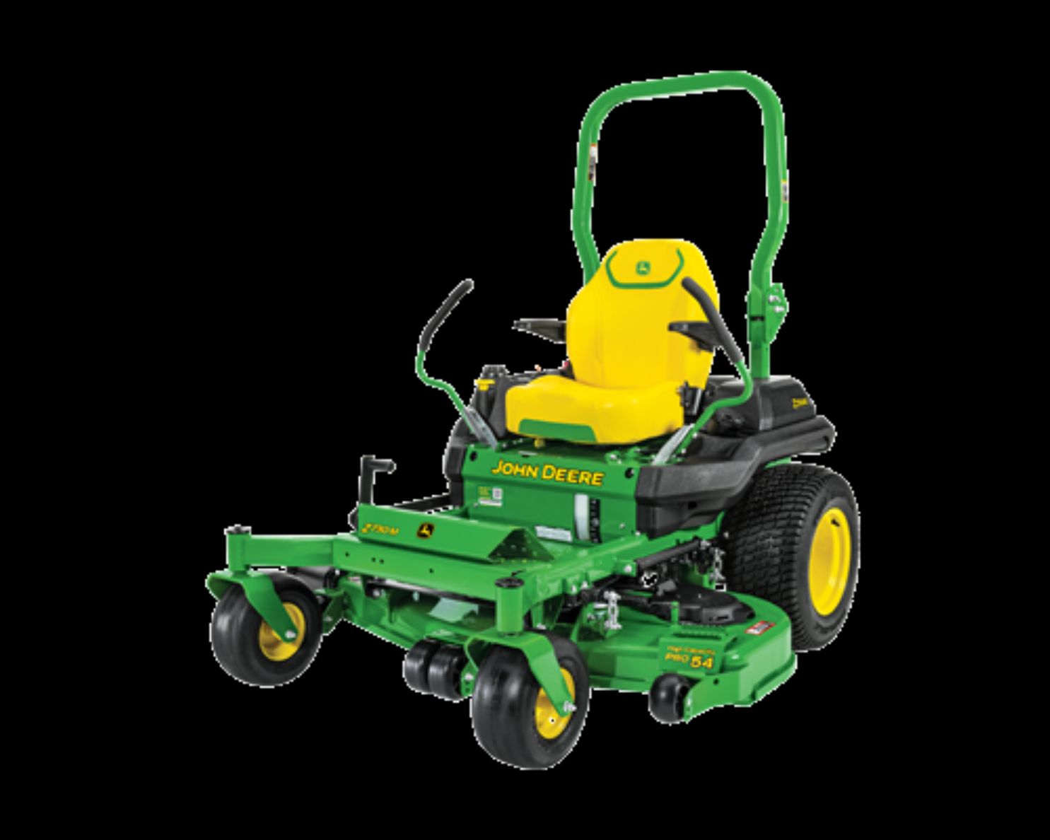 A technician in green workwear performs maintenance on a green John Deere tractor inside a well-lit workshop.