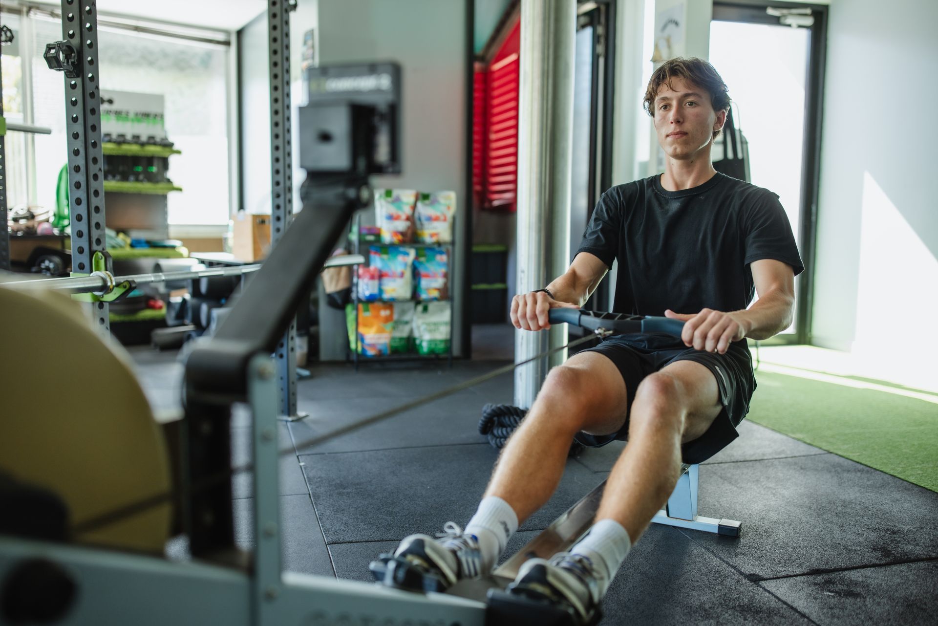 A group of people doing handstands and boxing gloves