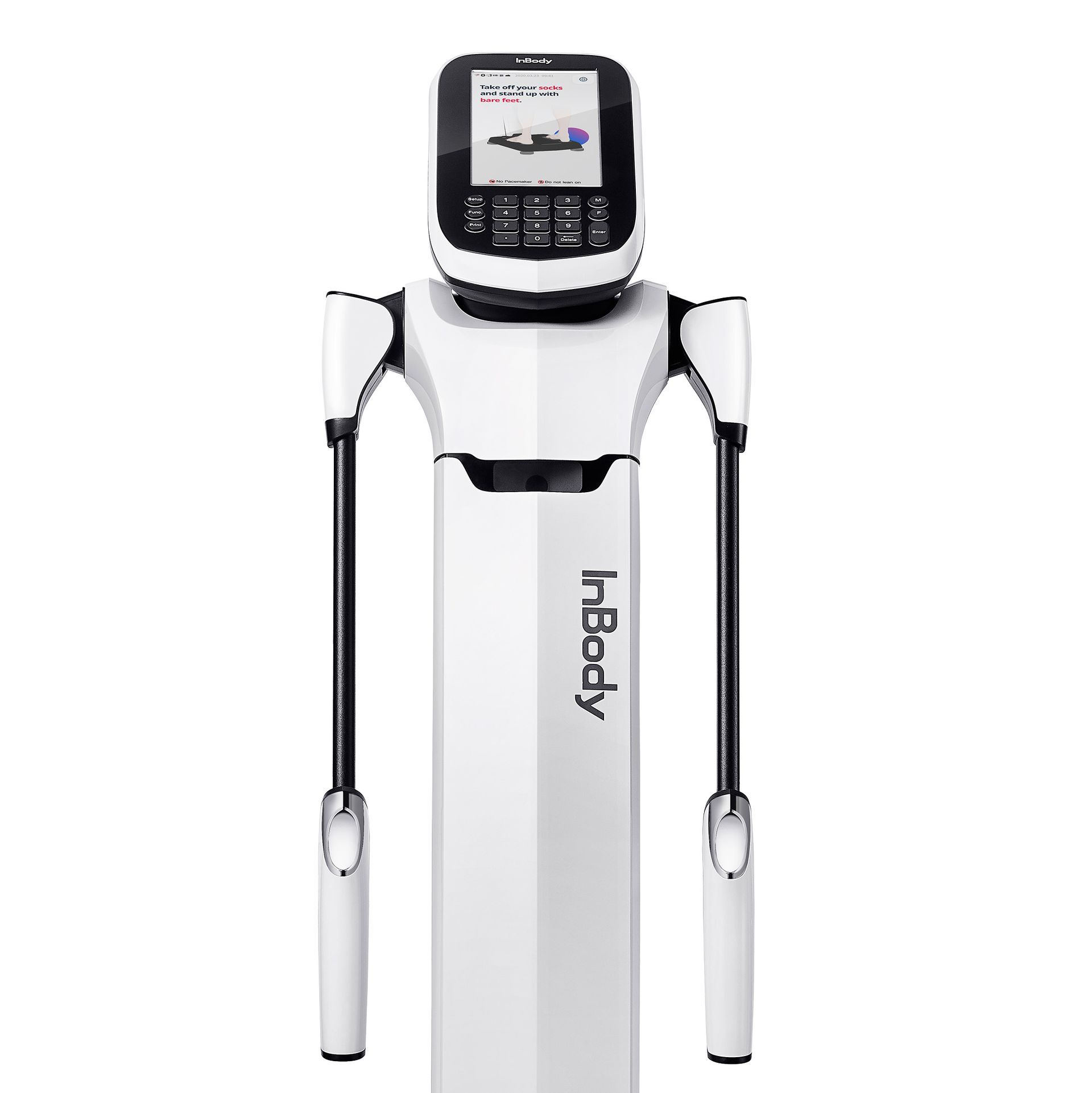 A man is squatting down next to a green barbell in a gym.