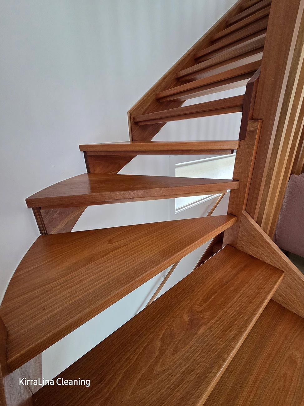 Wooden Staircase with Curved Steps, Leading Upwards — KirraLina Cleaning Services in Tweed Heads, NSW