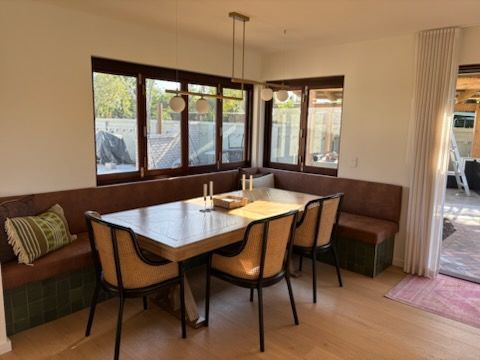 Dining room with a corner booth, table — KirraLina Cleaning Services in Tweed Heads, NSW