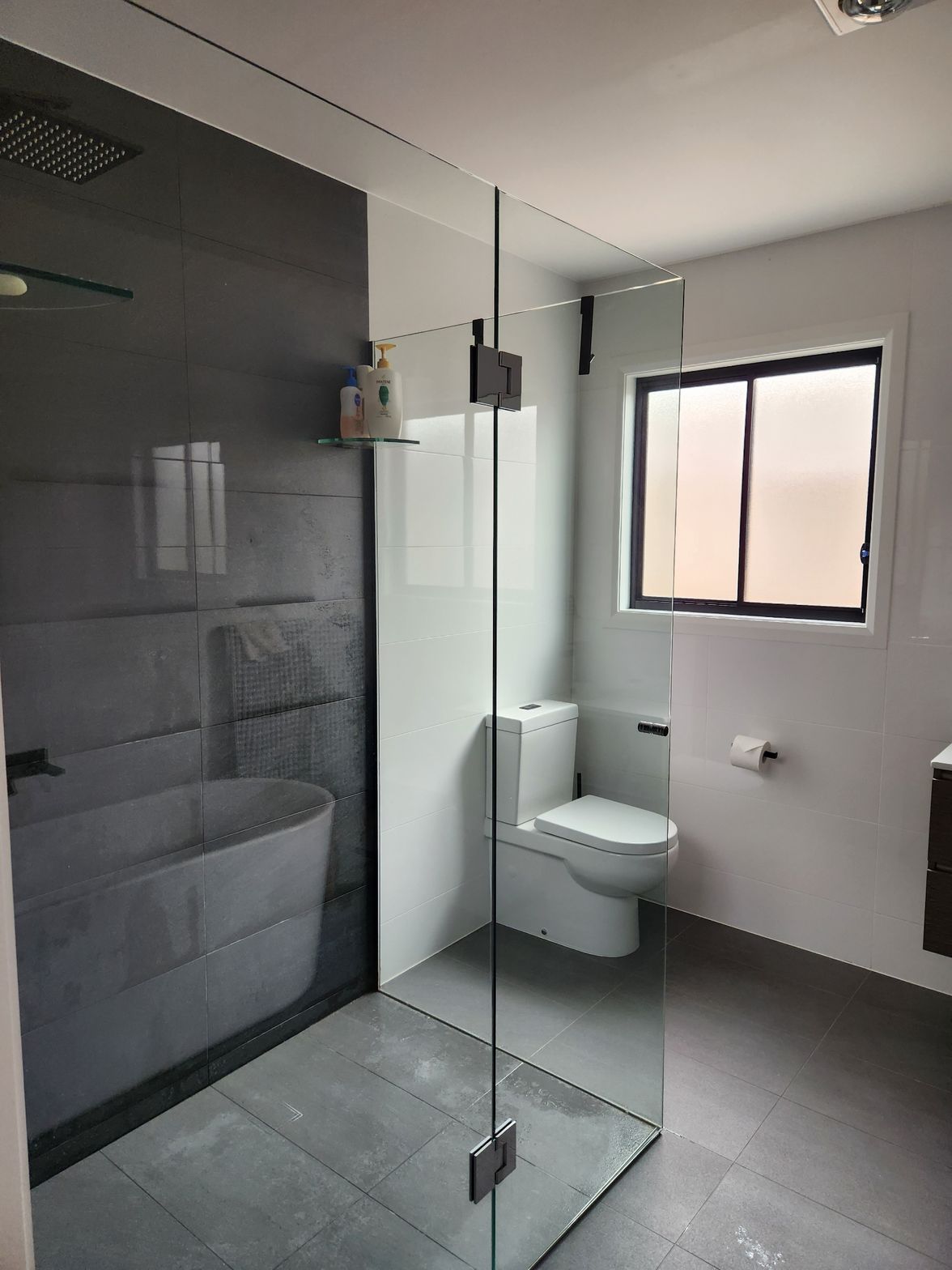 Clean bathroom black tiles