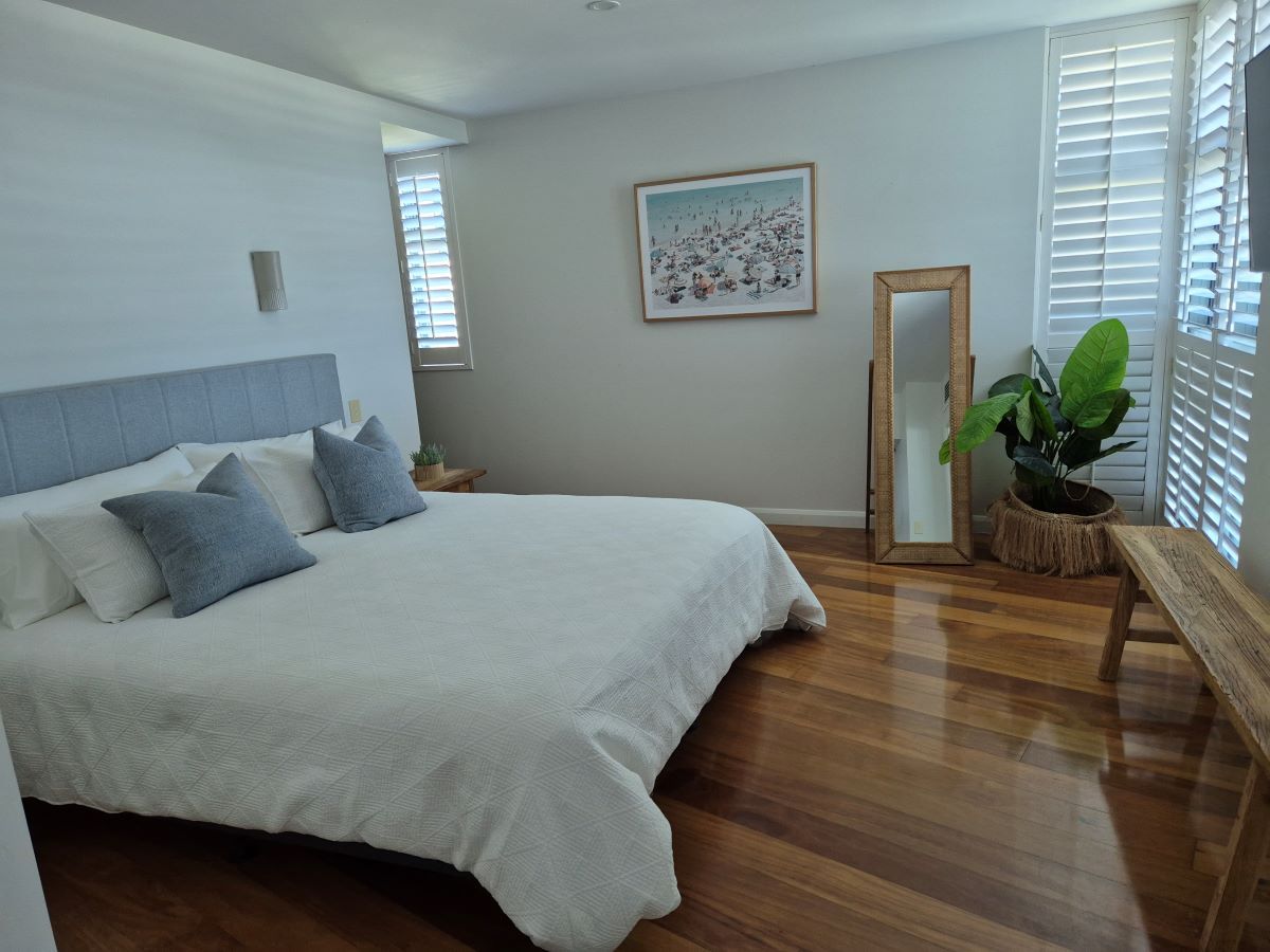 A Large Bed in The Room — KirraLina Cleaning Services in Banora Point, NSW