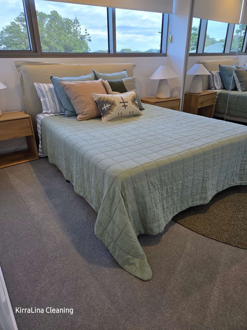 A Bedroom with A Bed, Nightstands, Lamps and A Couch — KirraLina Cleaning Services in Tweed Heads, NSW