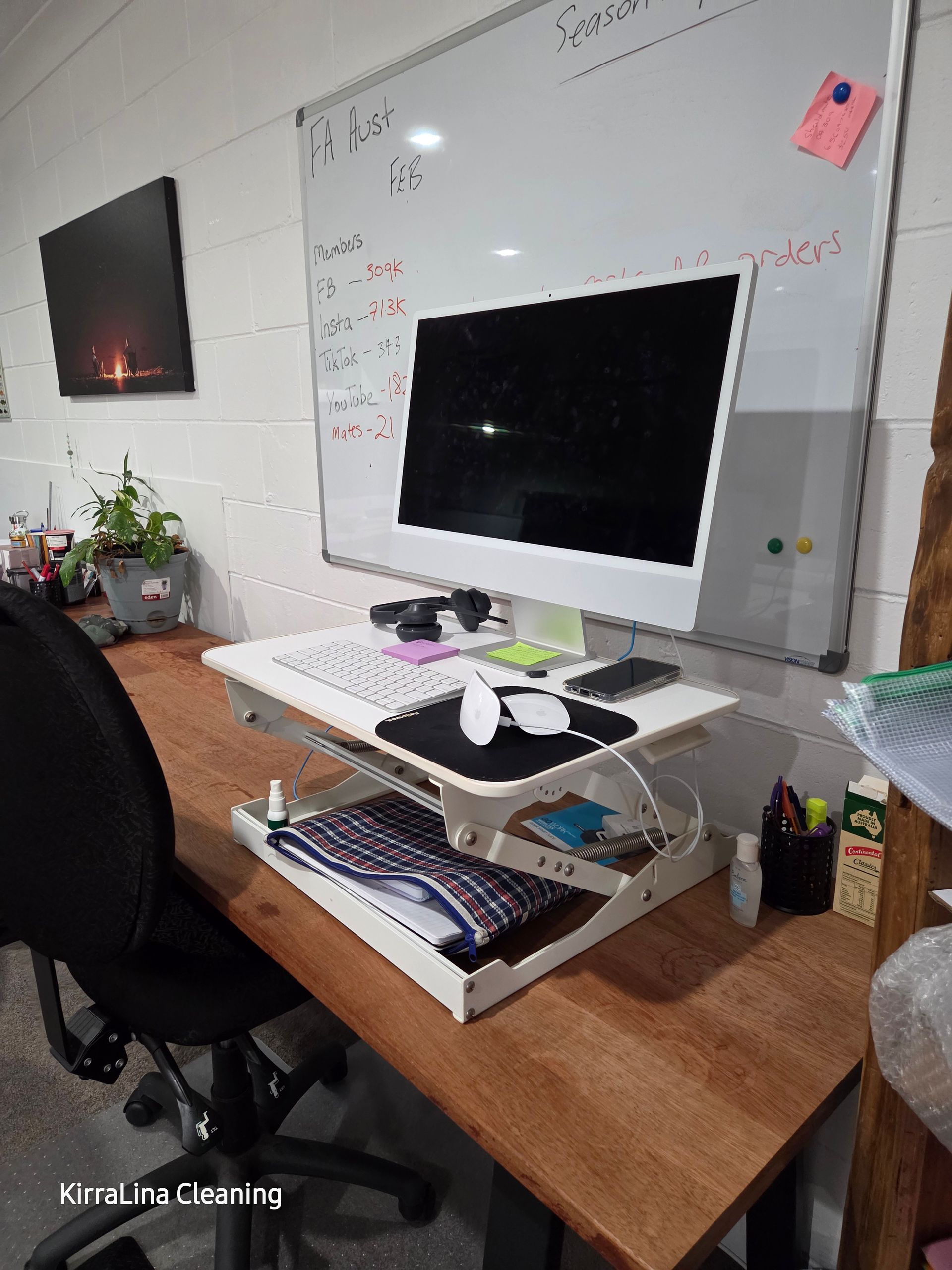 A White Computer on a Wooden Desk — KirraLina Cleaning Services in Kingscliff, NSW