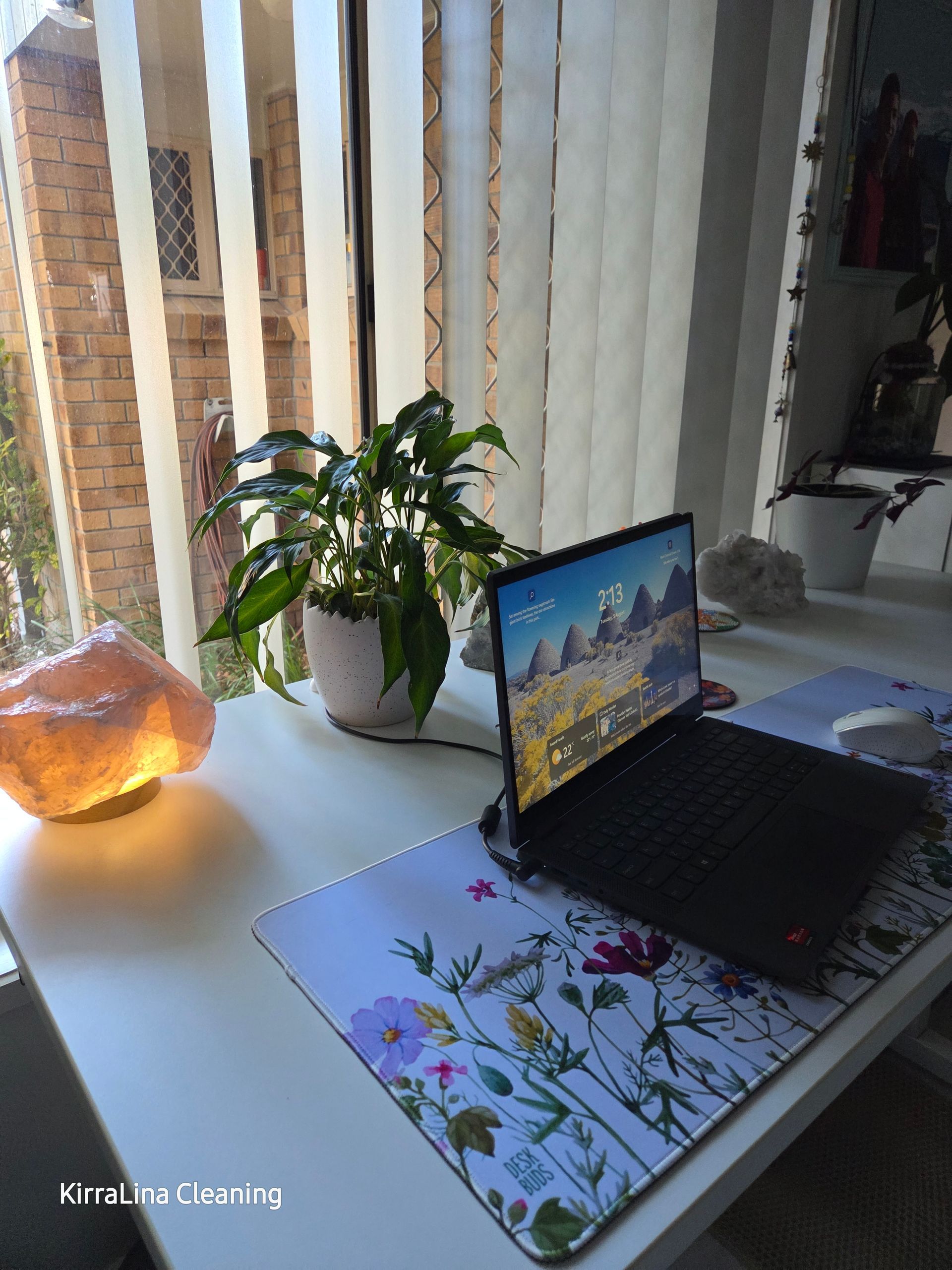 A Laptop on a desk with a Salt lamp — KirraLina Cleaning Services in Tweed Heads, NSW