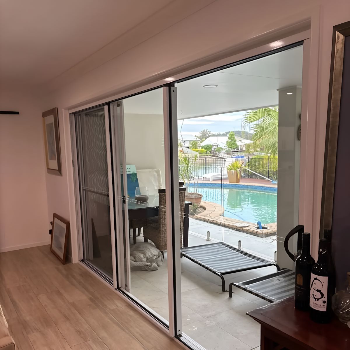 A Living Room with Sliding Glass Doors — KirraLina Cleaning Services in Tweed Heads, NSW