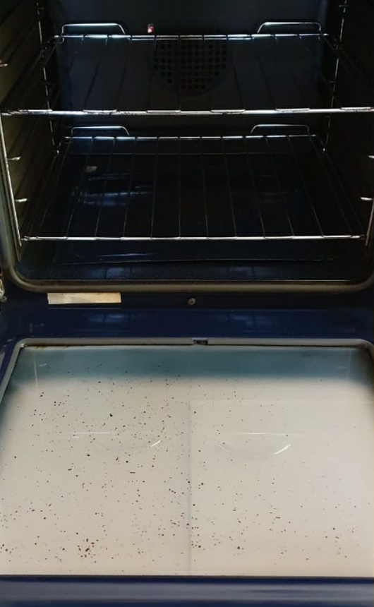 The Inside of a Dirty Oven With the Door Open — KirraLina Cleaning Services in Tweed Heads, NSW