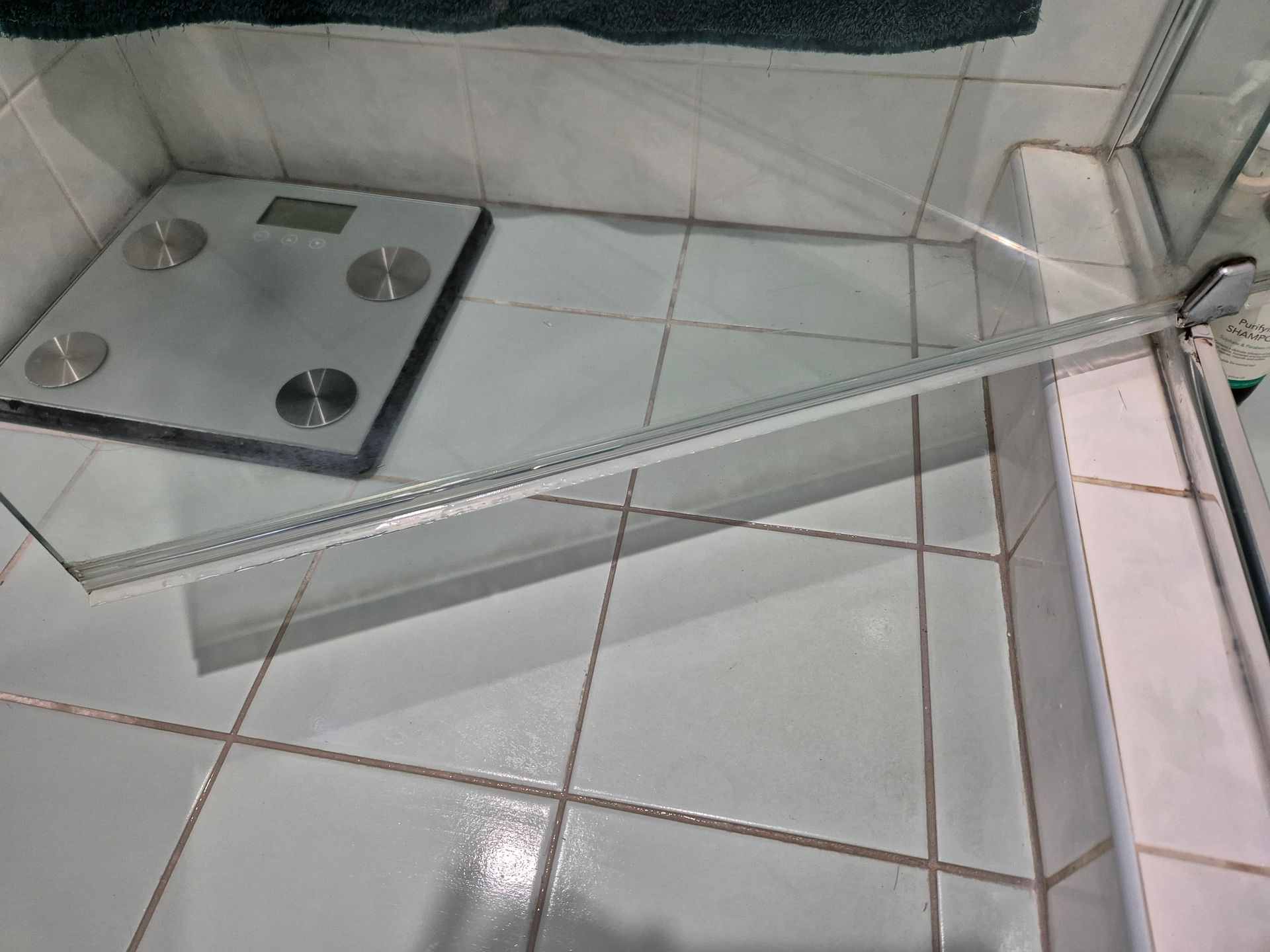 After: A Digital Scale Sits on a Tiled Shower Floor — KirraLina Cleaning Services in Kingscliff, NSW