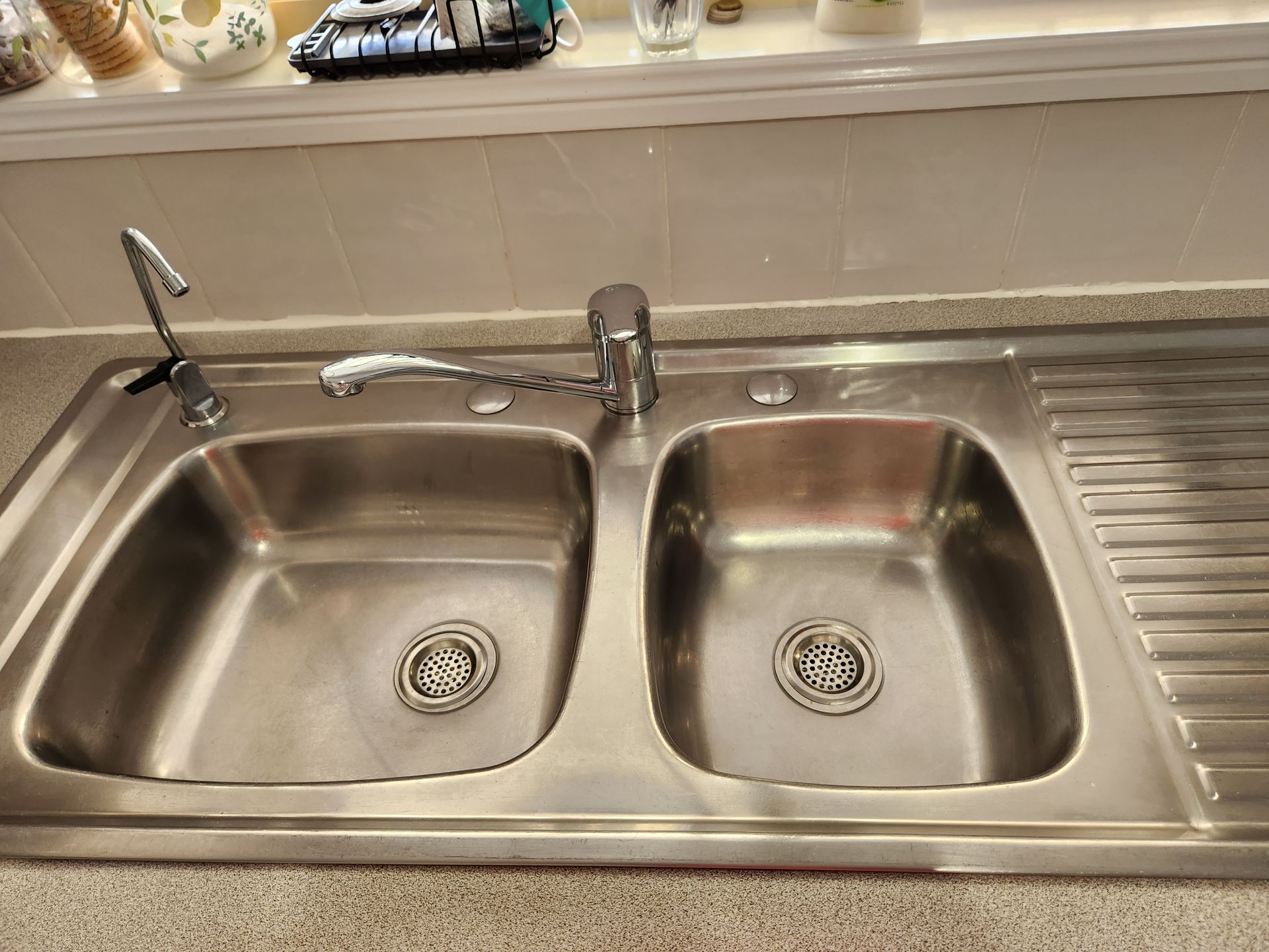 After: Stainless Steel Double Kitchen Sink With Two Faucets and a Drainboard — KirraLina Cleaning Services in Kingscliff, NSW