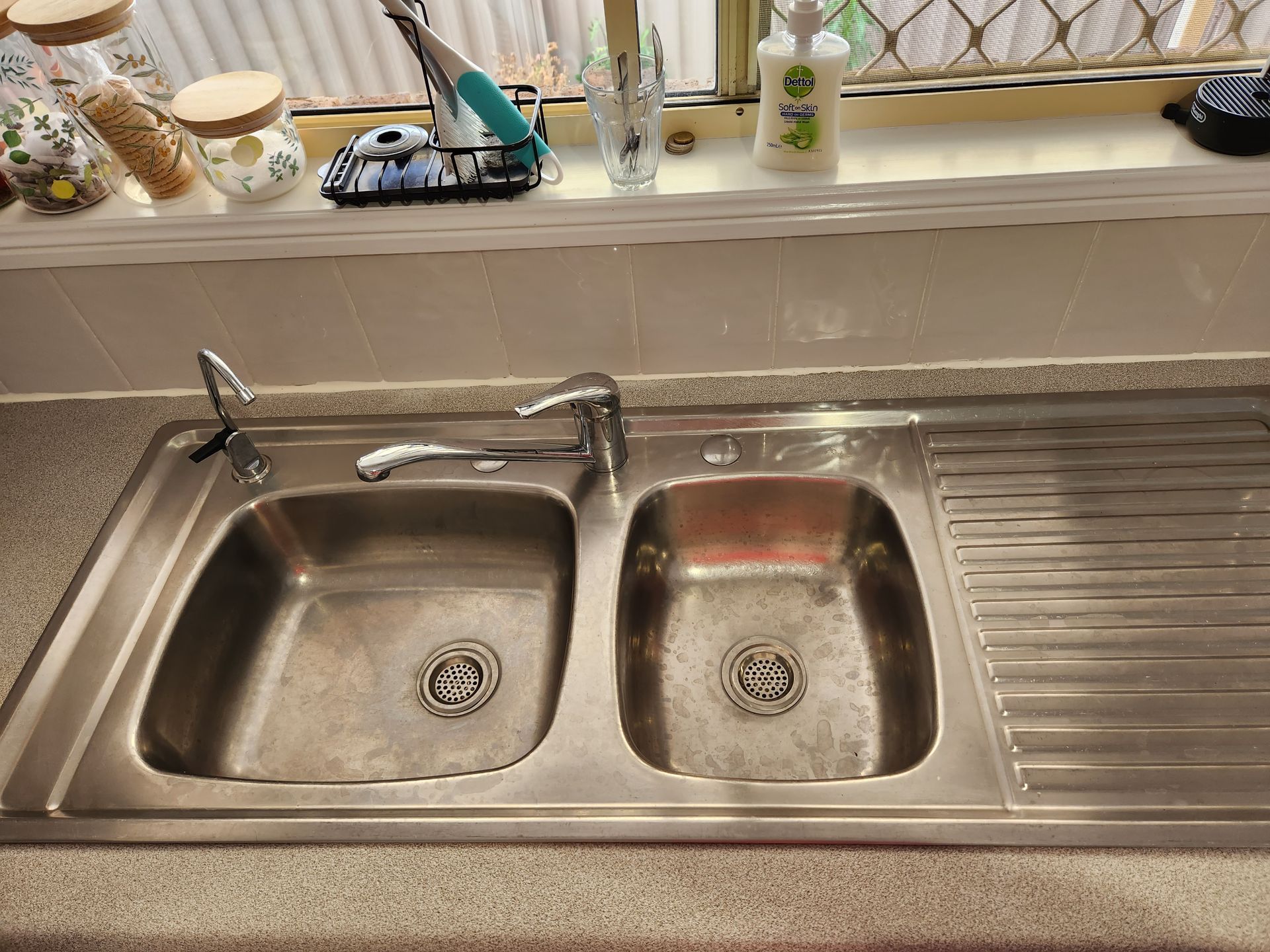 Before: Stainless Steel Kitchen Sink With Two Basins and a Drying Rack — KirraLina Cleaning Services in Kingscliff, NSW