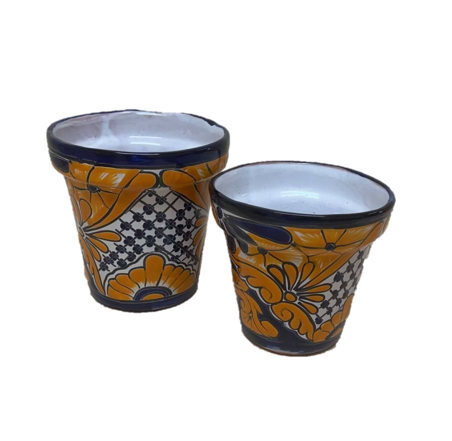 Two Ceramic Flower Pots With Yellow and Blue Floral Designs — Mexican Homewares Australia in Brisbane, QLD