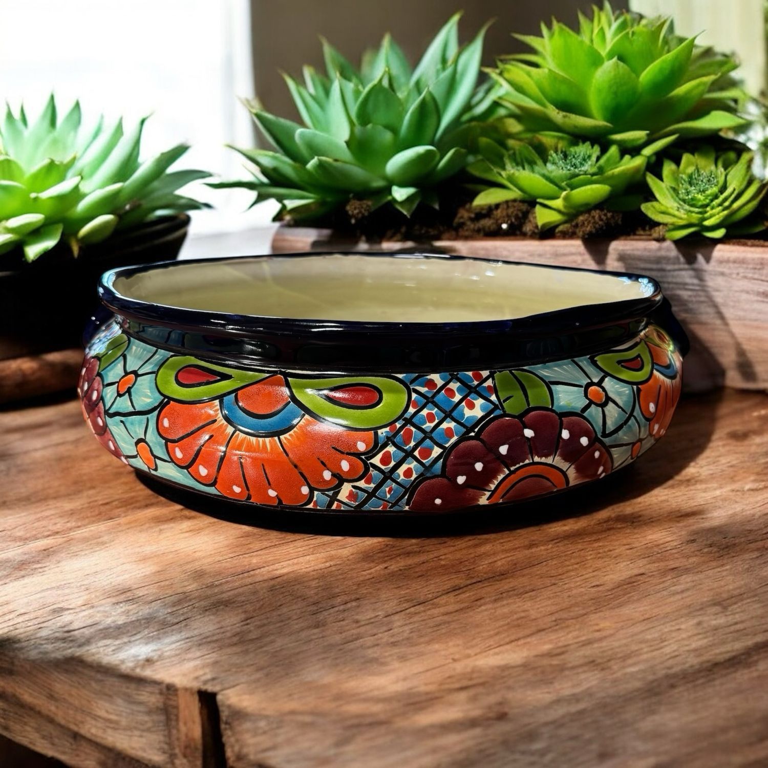 Colourful Floral Painted Ceramic Bowl on a Wooden Table — Mexican Homewares Australia in Canberra, ACT