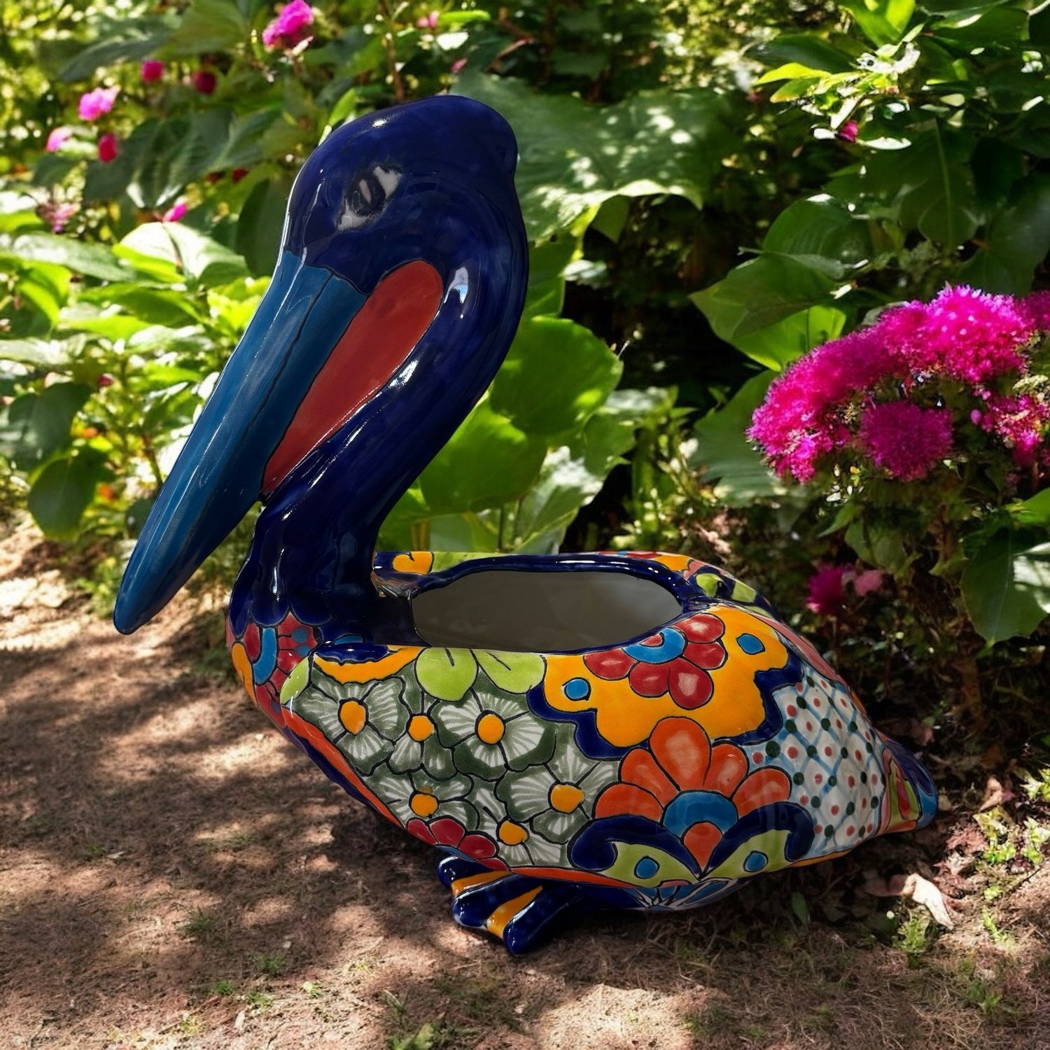 Ceramic Pelican Planter, Blue and Colourful Floral Design — Mexican Homewares Australia in Cairns, QLD
