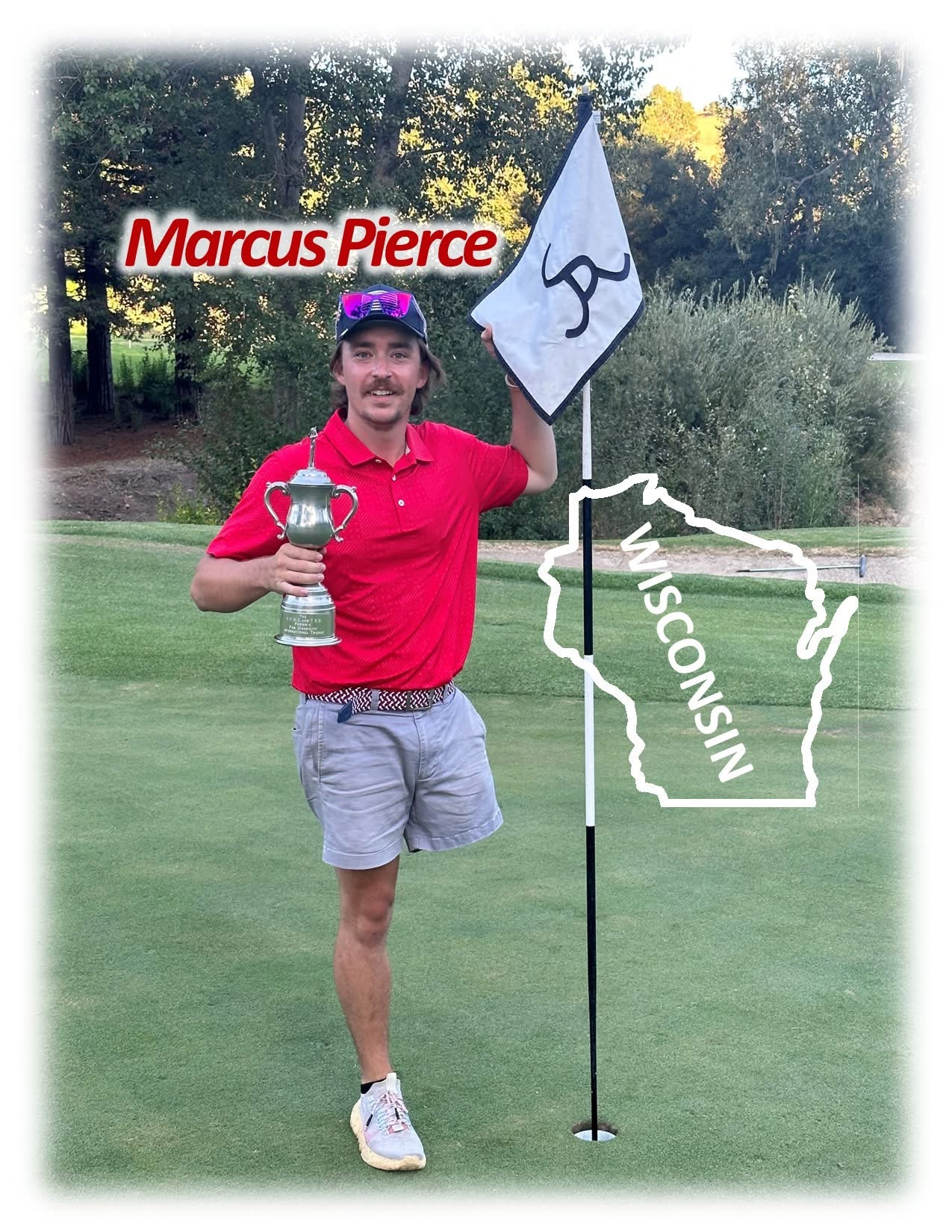 Golfer Marcus Pierce holds a trophy and flag in Wisconsin, on a green.