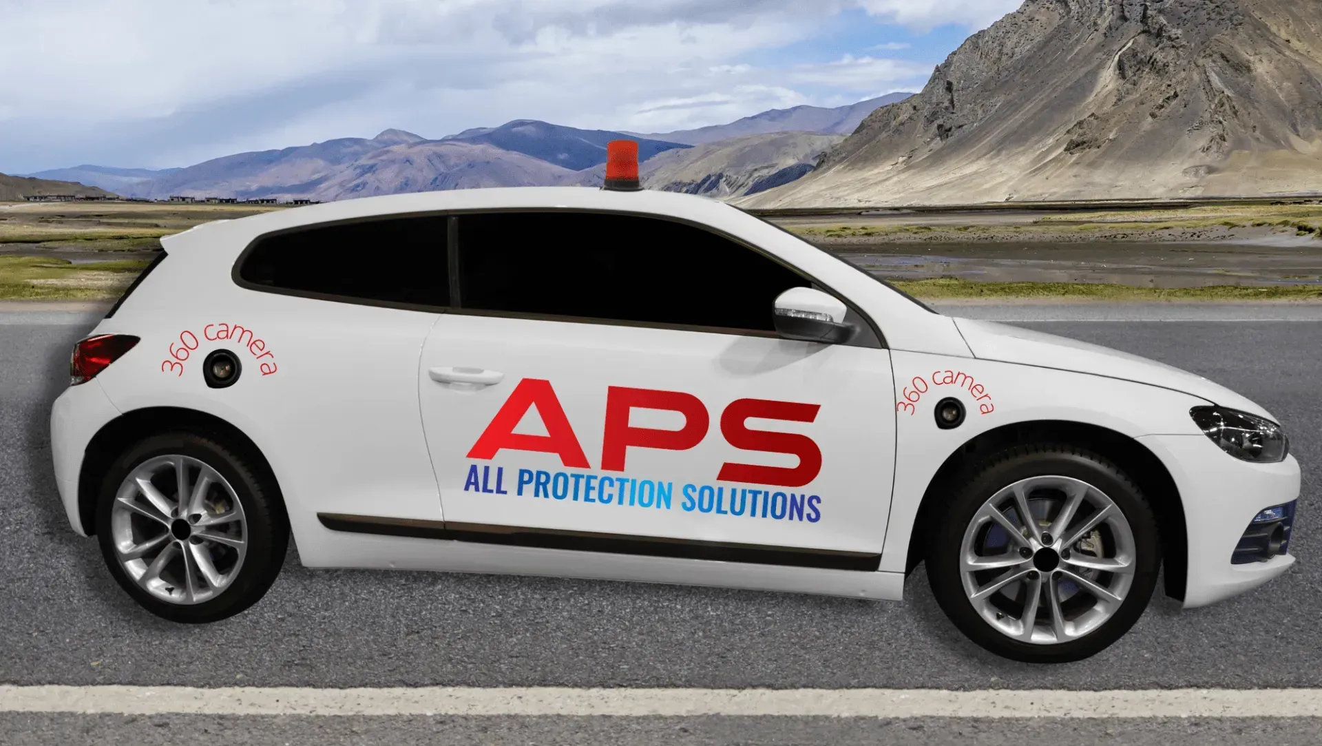 White APS Air Purification Solutions car parked on a road with mountains in the background