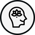 A circular icon featuring a minimalist profile of a human head containing a lotus flower symbol.