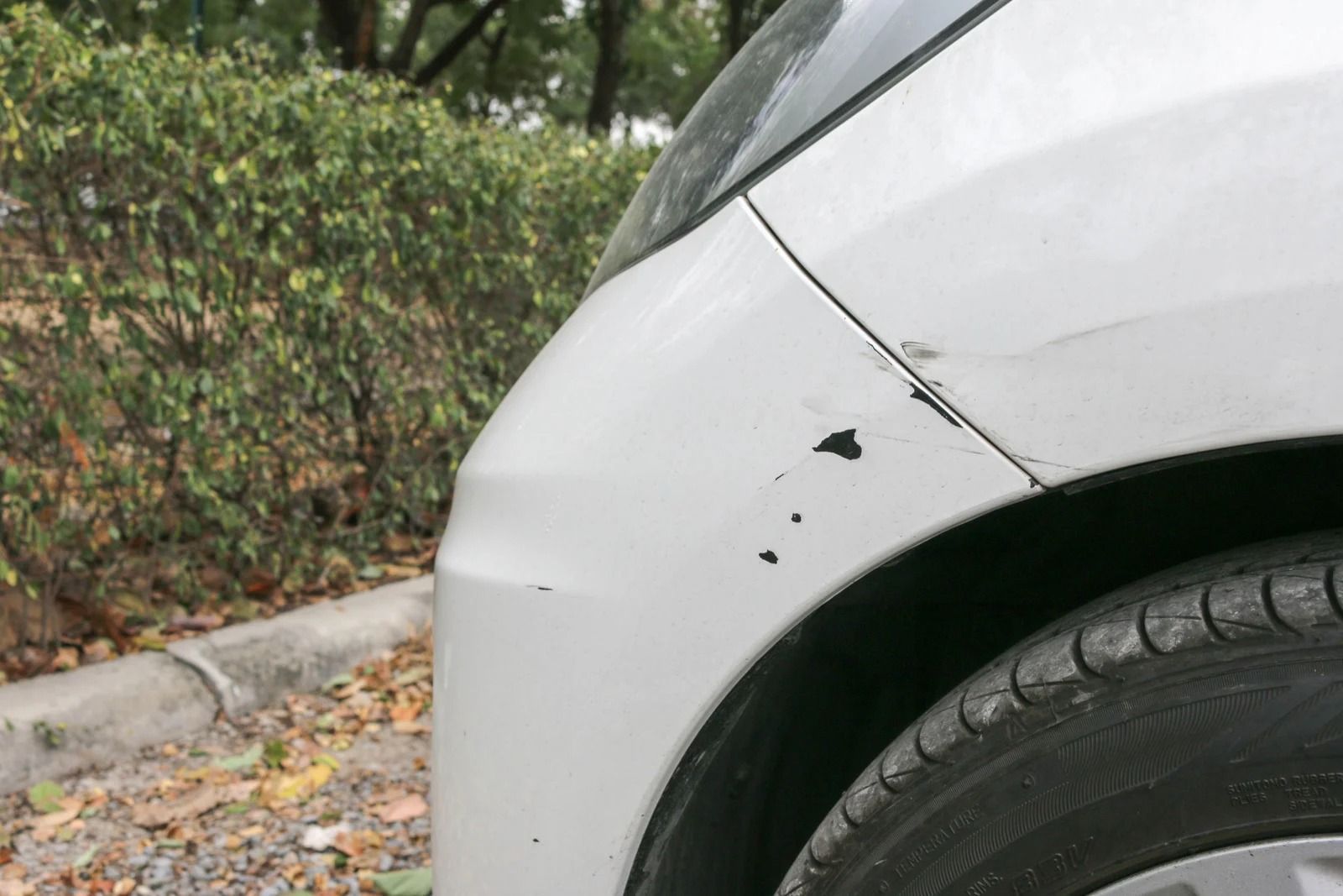 White car with scratch