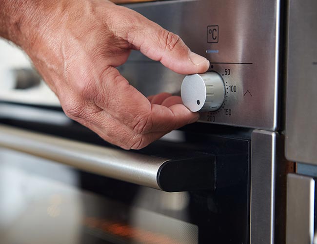 Setting Temperature Control On Oven - Machine in Albuquerque, NM