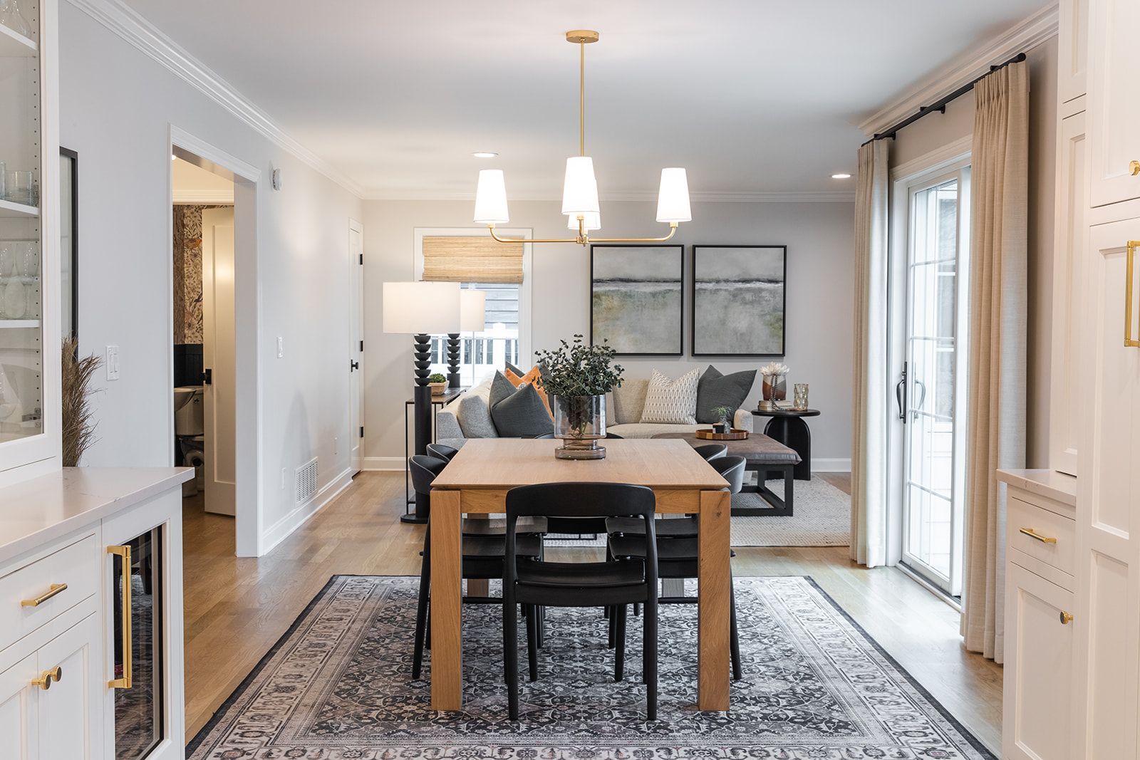 Dining room table and chairs in the middle of the room