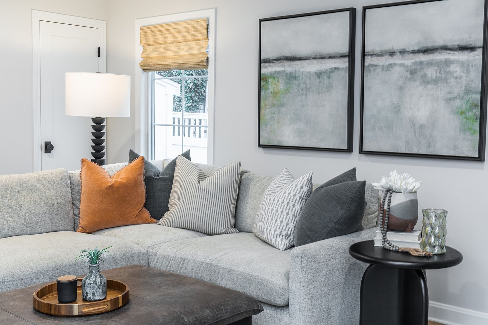 A living room with a sectional couch