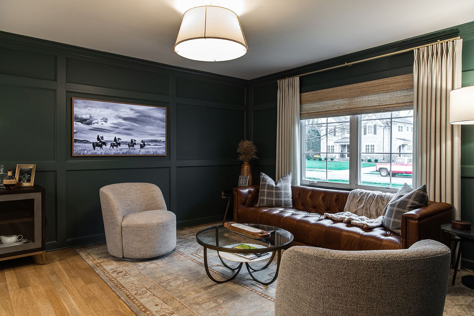 A living room with a coffee table and television.