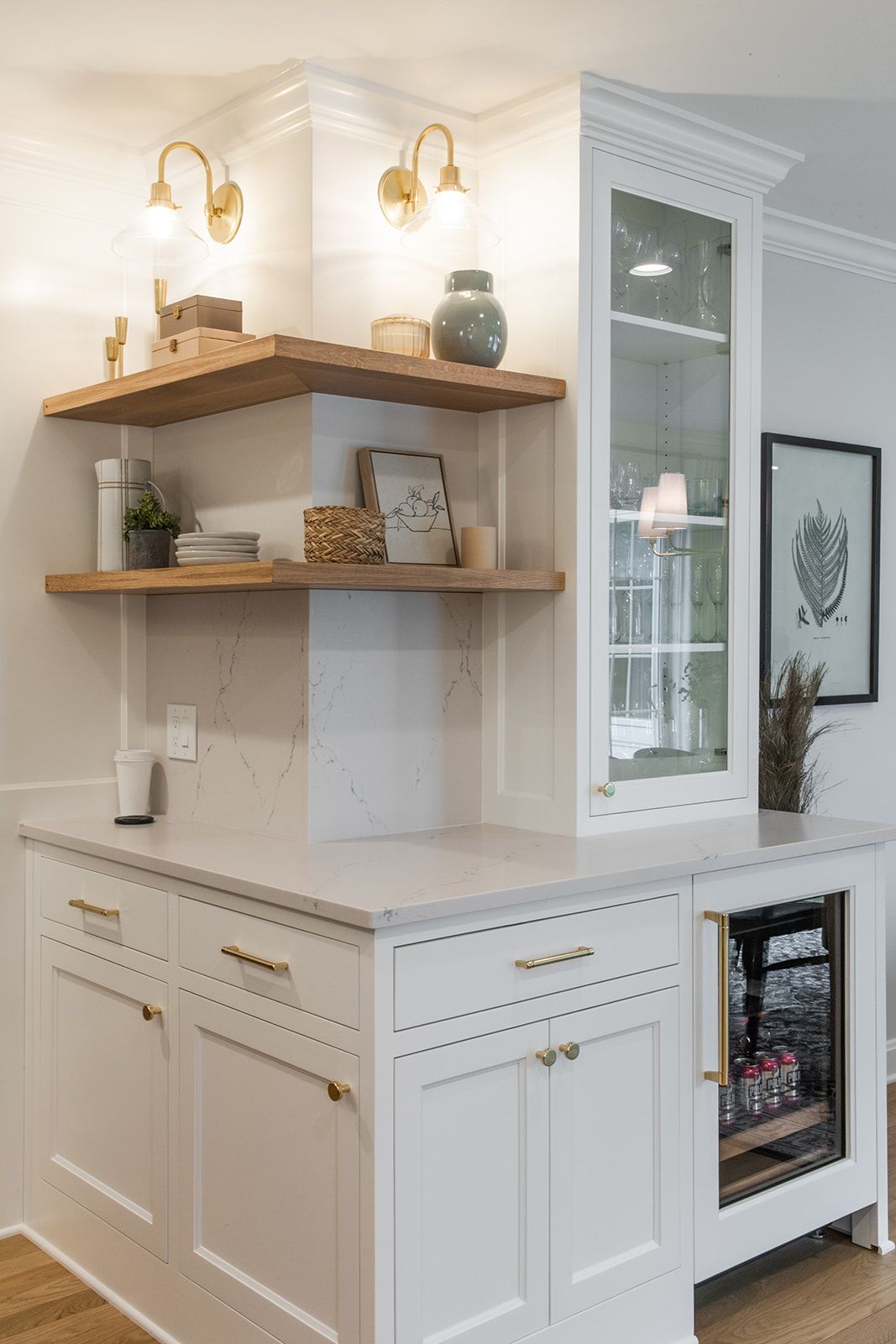 A kitchen with white cabinets