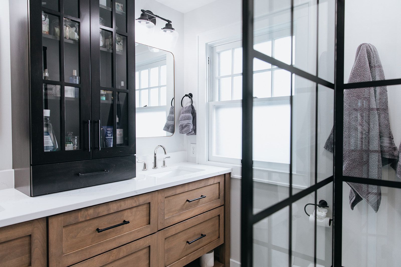 A bathroom with walk in shower