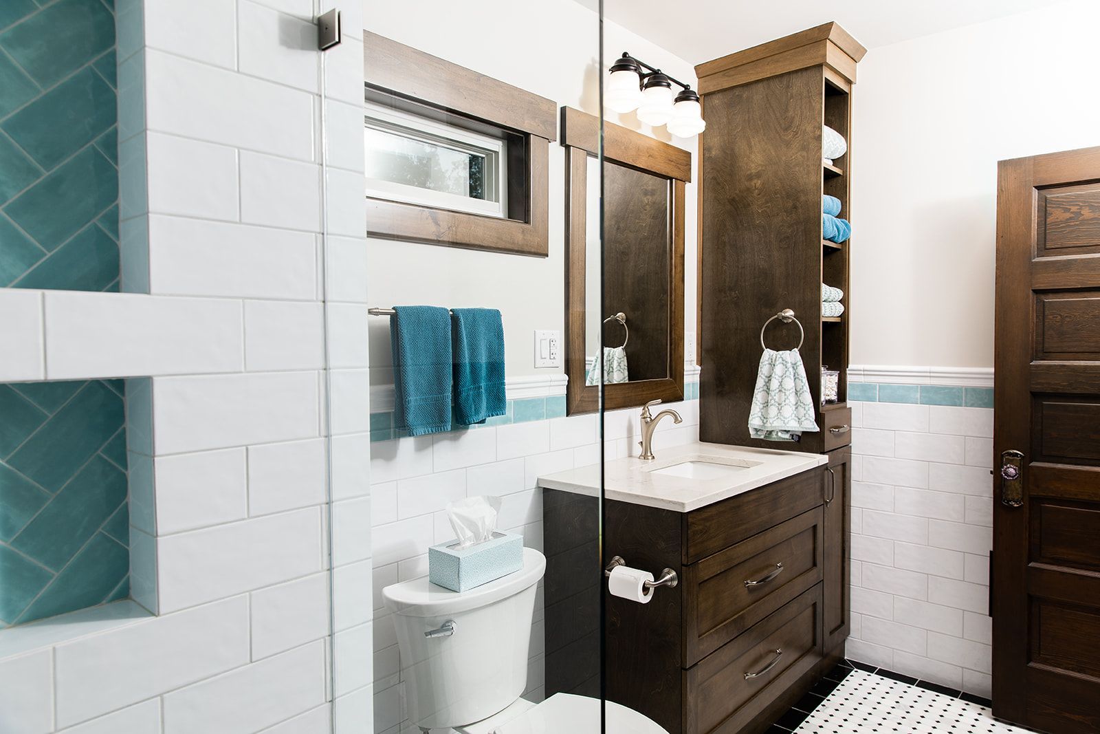 A bathroom with walk in shower