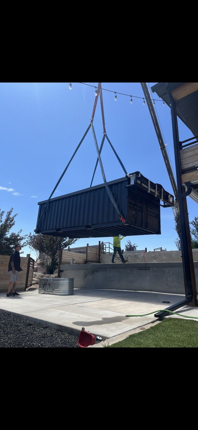 crane lifting a container pool