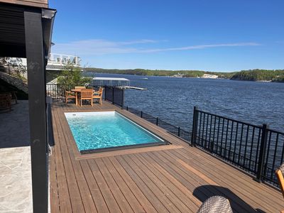 container swimming pool by a lake