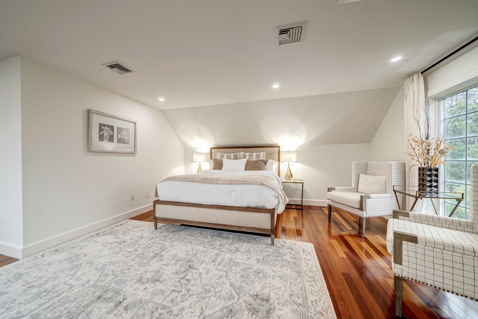 There is a large bed in the middle of the room.