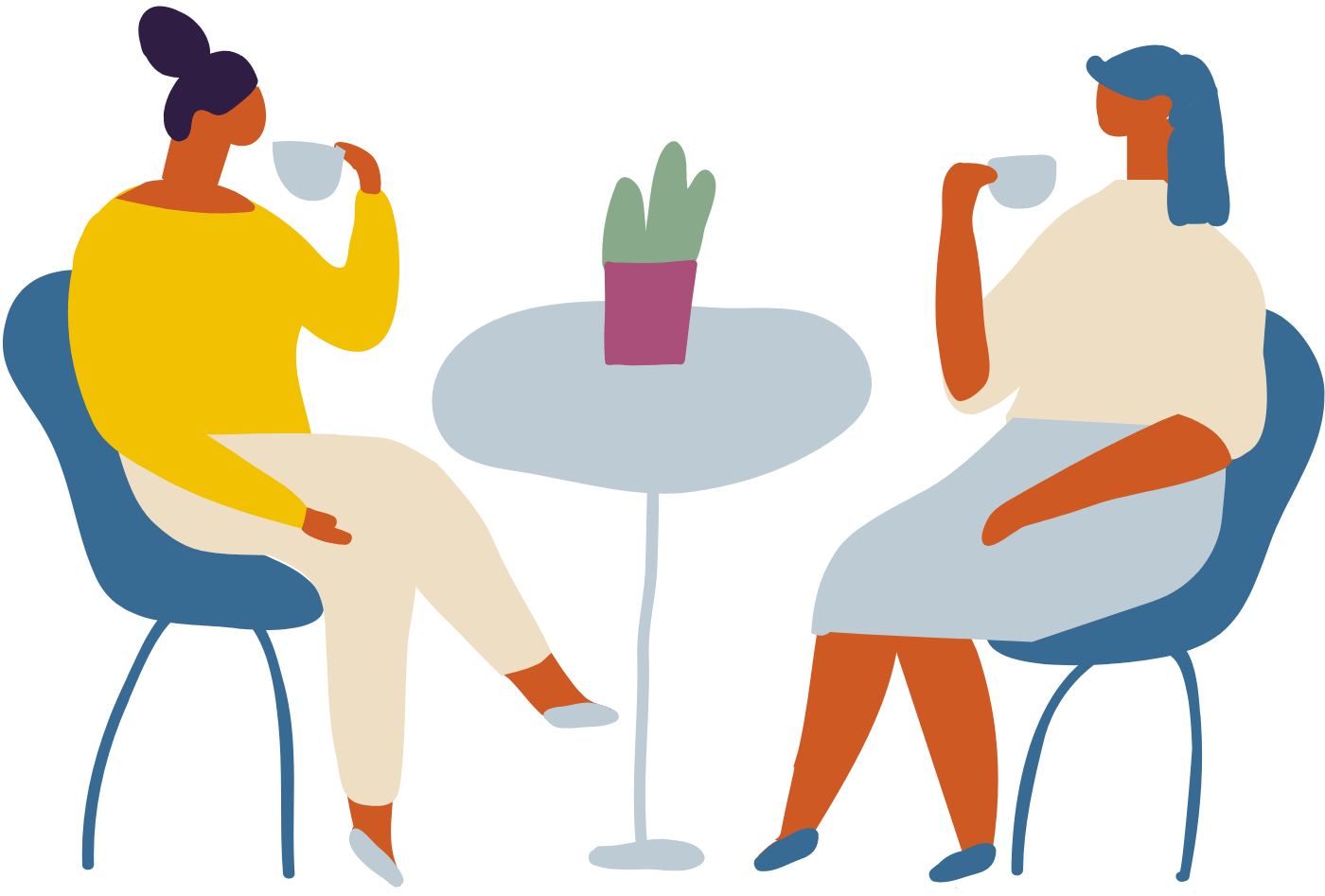 Two women drinking Cyprus coffee at a table
