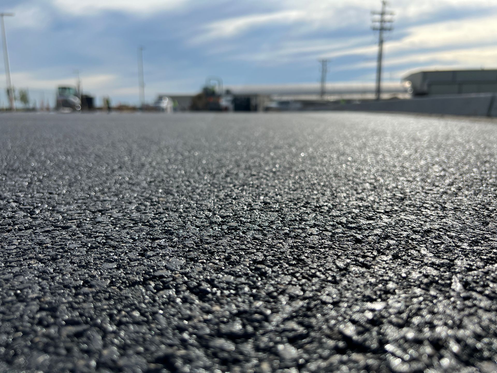 A close up of a road with a lot of gravel on it.