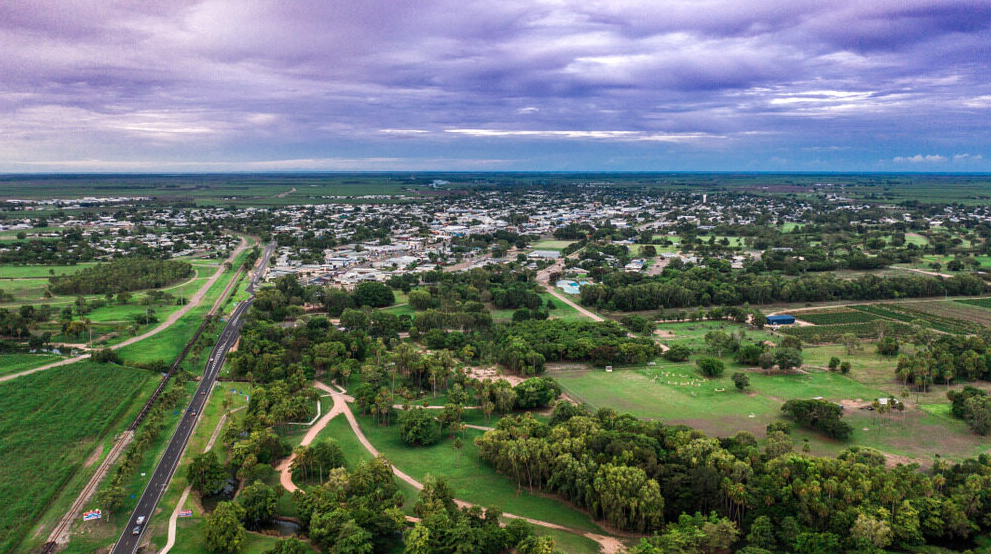 An Aerial View of a Small Town Surrounded by Trees and Fields 	— Gutterpro Townsville In Townsville, QLD