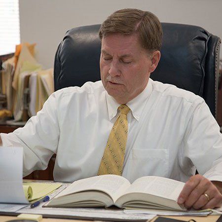 Lawyer Reading a Book — Kingsport, TN — Todd East Attorney