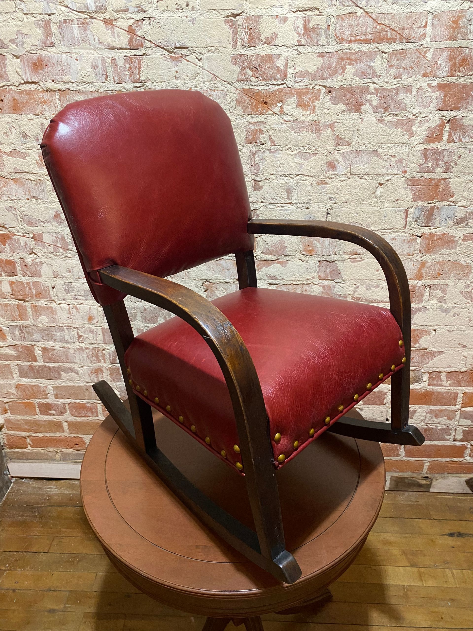 Child's red leather rocker